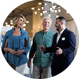 Sales team member showing a property to potential owners